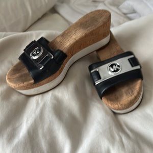 Michael Kors clogs- Navy blue. Very pretty